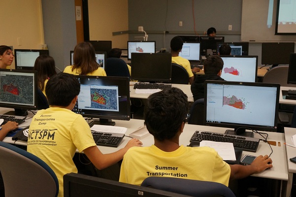 <span style="font-size:10px"> FIU students use GIS programs at the 2014 summer camp</span>